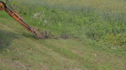 Tractor mowing grass Stock Footage 65837088