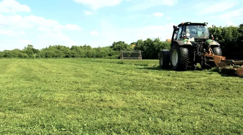 Tractor mowing the lawn Video stock 24245021