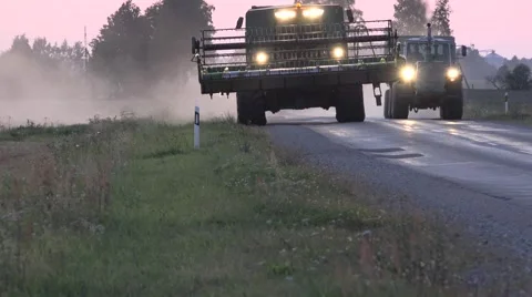 Tractor overtake combine Stock Footage 60041616