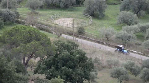 A tractor passes on the road Stock Footage 143582934