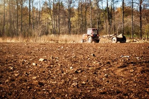 Tractor on pasture Stock Photos