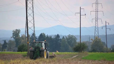 Tractor performs agricultural work in the field Stock Footage 226352868