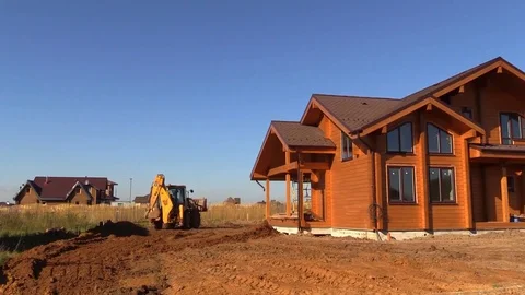 Tractor plan and align ground new building country house plot Vídeos de archivo 80820557