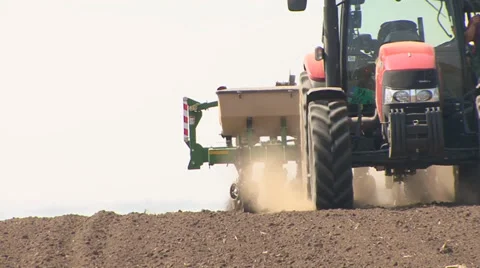 Tractor with planter without driver Stock Footage 39672194
