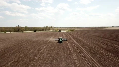 Tractor planting corn Stock Footage 199410830