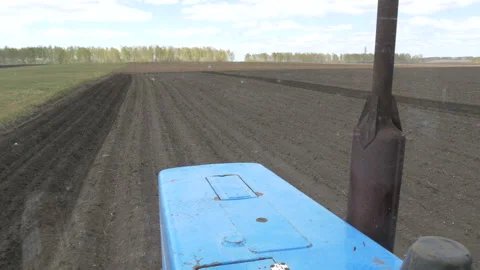 Tractor at planting work in the field. Stock Footage 197549847