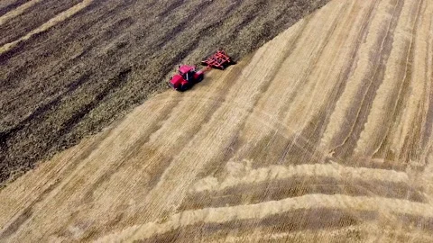 Tractor With Plough Plowing A Field Stock Footage 230075877