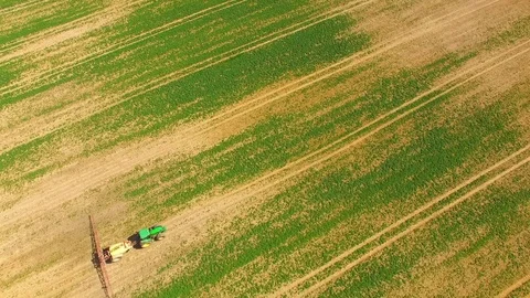 Tractor with plough working on a field. Stock Footage 74196899
