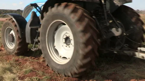 Tractor ploughing farm fields Stock Footage 51179601