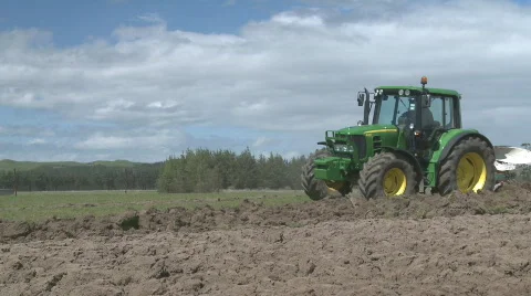 Tractor ploughing a field Stock Footage 873601