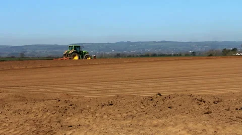 Tractor ploughing field Stock Footage 46517456