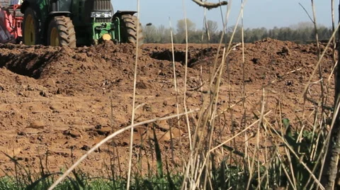 Tractor ploughing field Stock Footage 46519627