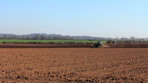 Tractor ploughing field Stock Footage 46520079