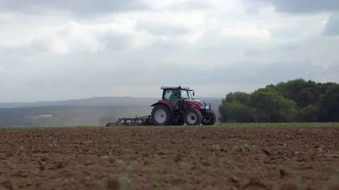 Tractor is ploughing Stock Footage 146225331