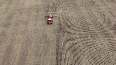 Tractor with plow in the field Stock Footage 234196523