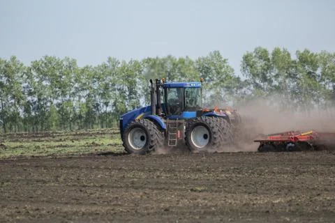 Tractor with plow Foto stock