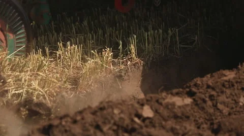 Tractor with plow plowing the land Stock Footage 56684290