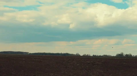 Tractor Plowing at Dusk Stock Footage 62593618