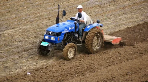 Tractor plowing the field 08 (tracking shot) Stock Footage 23691506