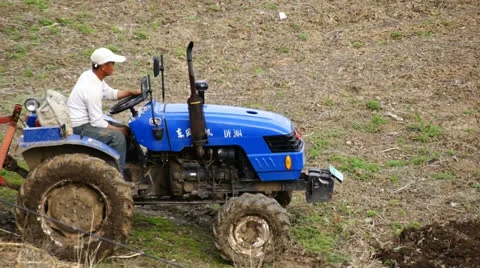 Tractor plowing the field 09 (tracking shot) Stock Footage 23691846