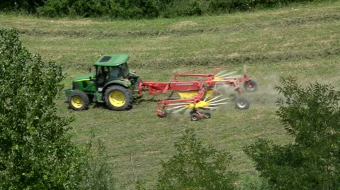 A tractor plowing a field 3 Stock Footage 41336669