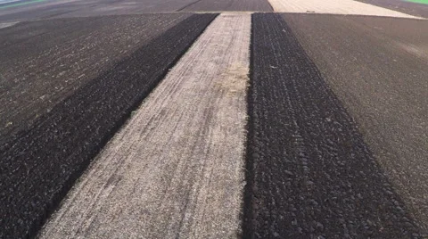 Tractor plowing field on cloudy fall day. Aerial footage. Stock Footage 57374158