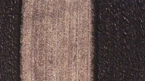 Tractor plowing field on cloudy fall day. Aerial footage. Stock Footage 57374221