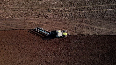 Tractor plowing field, drone view. Cultivated land and soil tillage. Vídeo Stock 191837846