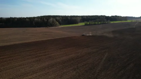Tractor plowing field, drone view. Cultivated land and soil tillage. Vídeo Stock 191838387