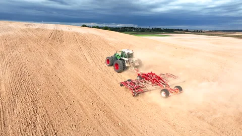 Tractor Plowing field, drone view. Cultivated and soil tillage. 스톡 동영상 211429788