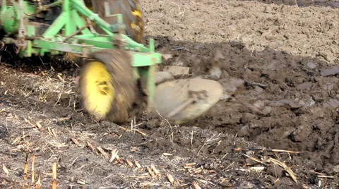 Tractor plowing a field Stock Footage 952569