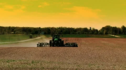 Tractor plowing field Stockbeeldmateriaal 11153371