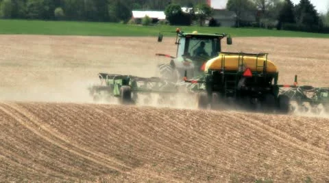 Tractor plowing a field Video stock 11401638