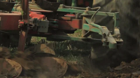 Tractor plowing a field Stock Footage 33390726