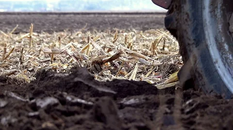 Tractor plowing field Stock Footage 48846494