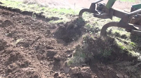 Tractor plowing field Stock Footage 62507259