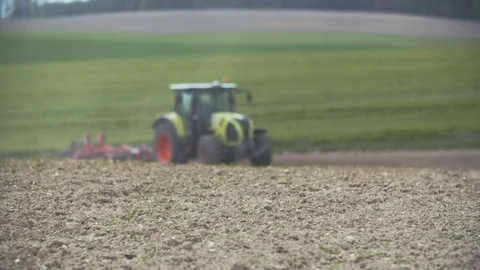 Tractor Plowing Field Stock Footage 75488833