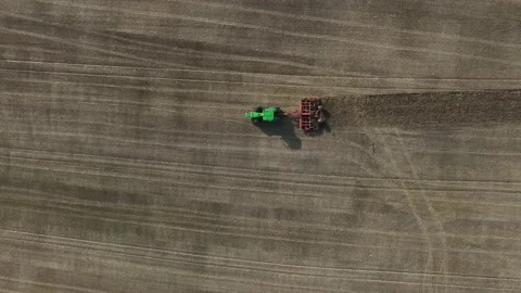 Tractor plowing a field Video stock 209156796