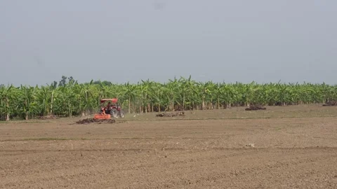 Tractor Plowing Field Stock Footage 333957749