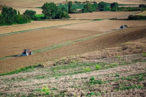 Tractor plowing field Foto stock