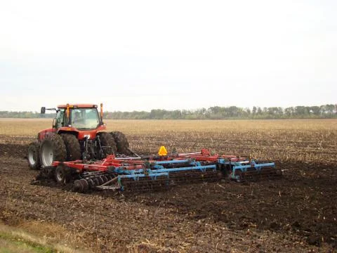 Tractor plowing a field Foto stock