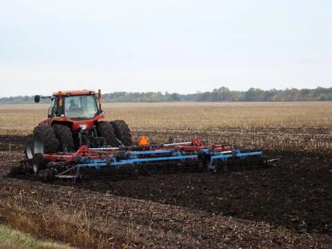 Tractor plowing a field 스톡 사진