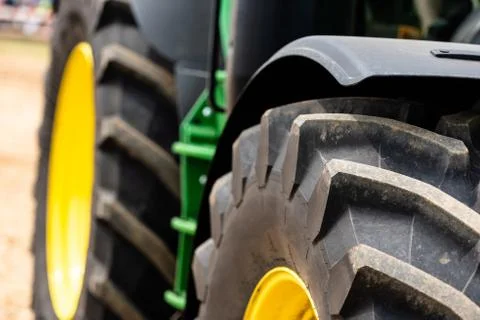 Tractor plowing field Stock Photos