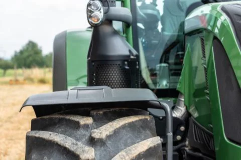 Tractor plowing field Stock Photos