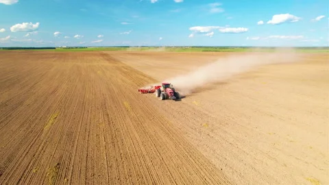 Tractor plowing field. Tractor plow soil cultivating. Sowing seeds Stock-Footage 167560536