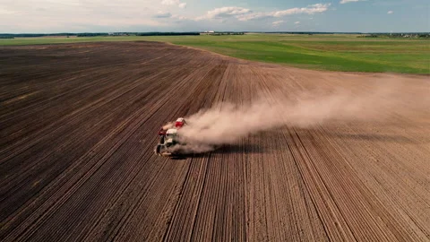 Tractor plowing field. Tractor plow soil cultivating. Sowing seeds Video stock 167562648