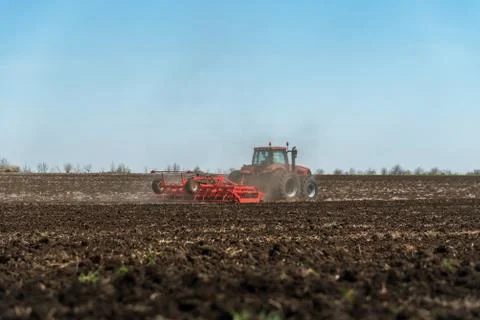 Tractor plowing fields. Stock-Fotos