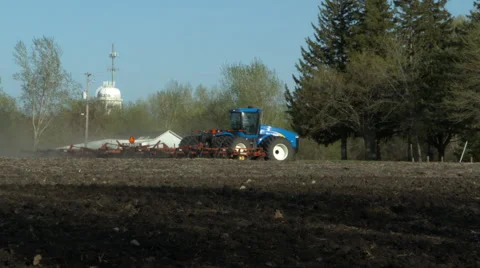 Tractor plowing Stock Footage 52529617