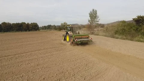 Tractor plowing Stock Footage 100329892