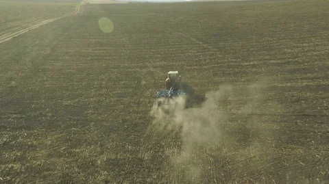 Tractor Plowing Stock Footage 105747296